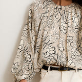 NICHOLASSA | Blusa con estampado floral
