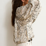 NICHOLASSA | Blusa con estampado floral