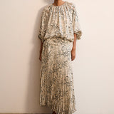 NICHOLASSA | Falda plisada con estampado floral