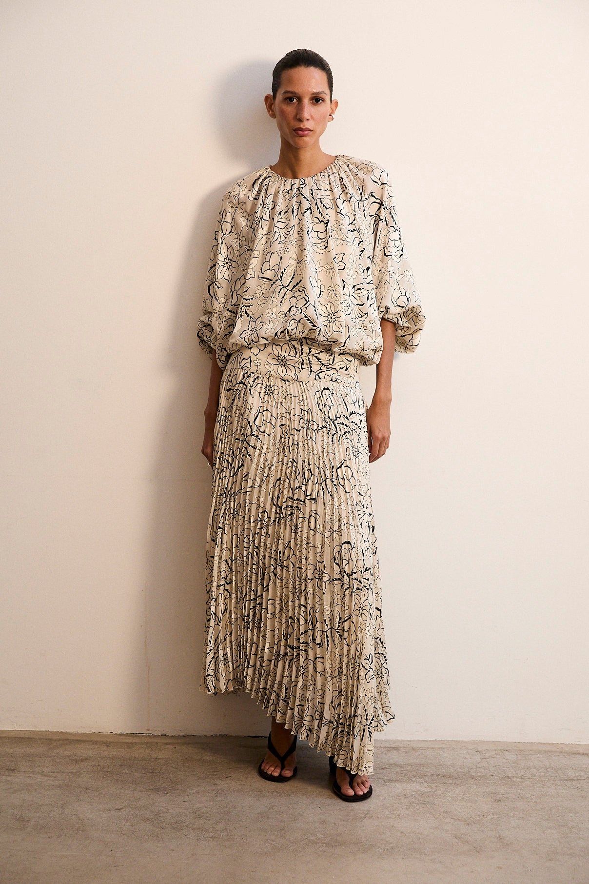 NICHOLASSA | Falda plisada con estampado floral