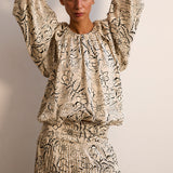 NICHOLASSA | Blusa con estampado floral