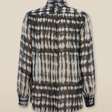 CAROL | Blusa transparente con estampado negro y crudo